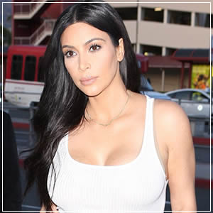 Kim Kardashian in Clingy White Tank-Dress