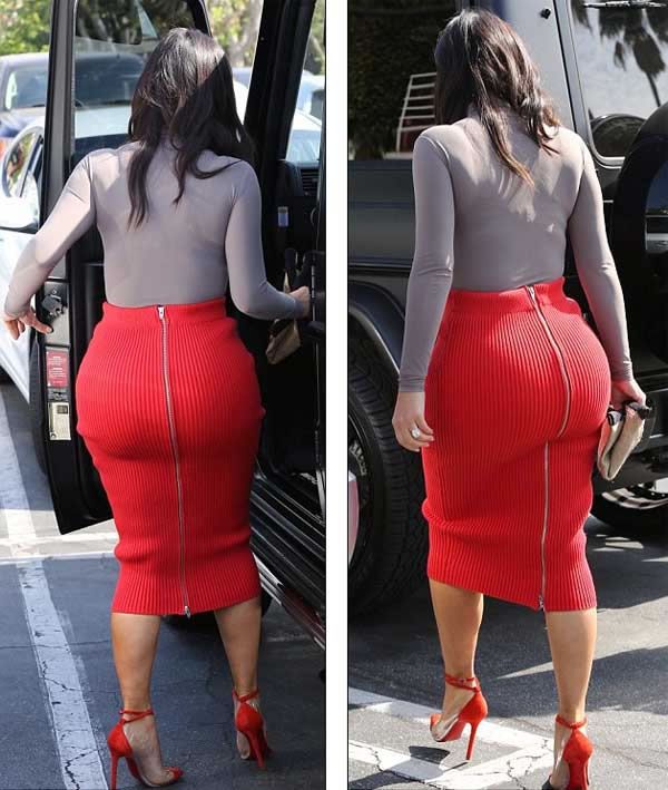 Kim Kardashian in a high-waisted woolen rouge red skirt