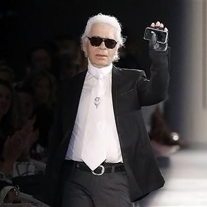 Designer Lagerfeld Calls French President "Idiot" Over Taxes