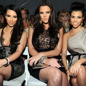 Kardashian Sisters Flaunt Their Swimwear Collection At Miami Beach