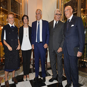 Prada Christens Men's Stores