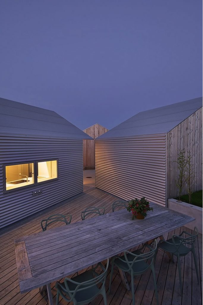 Five Little Houses Comprise a Single Home