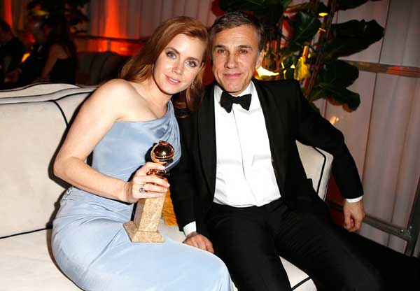 Amy Adams in Atelier Versace and Christoph Waltz