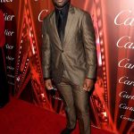 David Oyelowo in Calvin Klein Collection with Ava DuVernay and Brad Pitt in Tom Ford