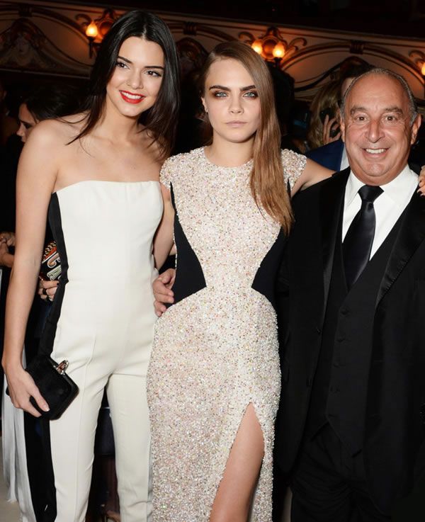 Kendall Jenner, Cara Delevingne in Burberry, and Sir Phillip Green