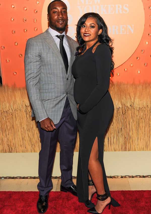 Mario Manningham in JB Clothier and Tiffany Hughley in Halston Heritage