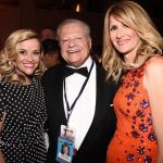 Reese Witherspoon in Michael Kors with Harold Matzner and Laura Dern in Matthew Williamson