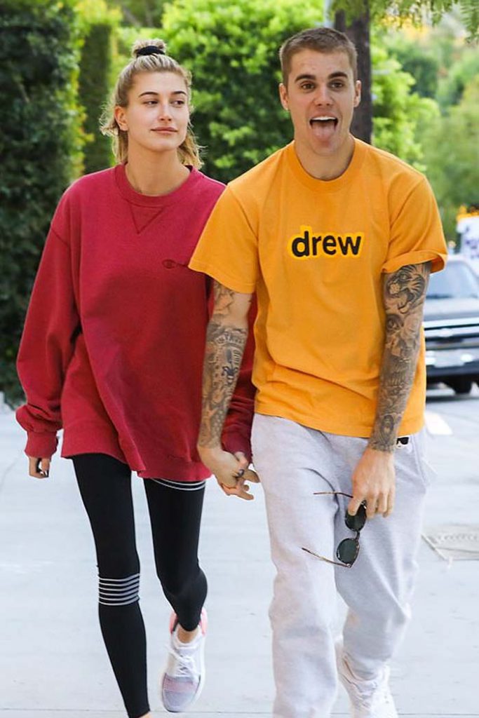 Justin Bieber tears off Hailey Bieber’s garter with his teeth in ...