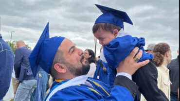 Graduate Sprints Across Stage with Baby in Arms as Security Tries to Stop Him and Crowd Goes Wild